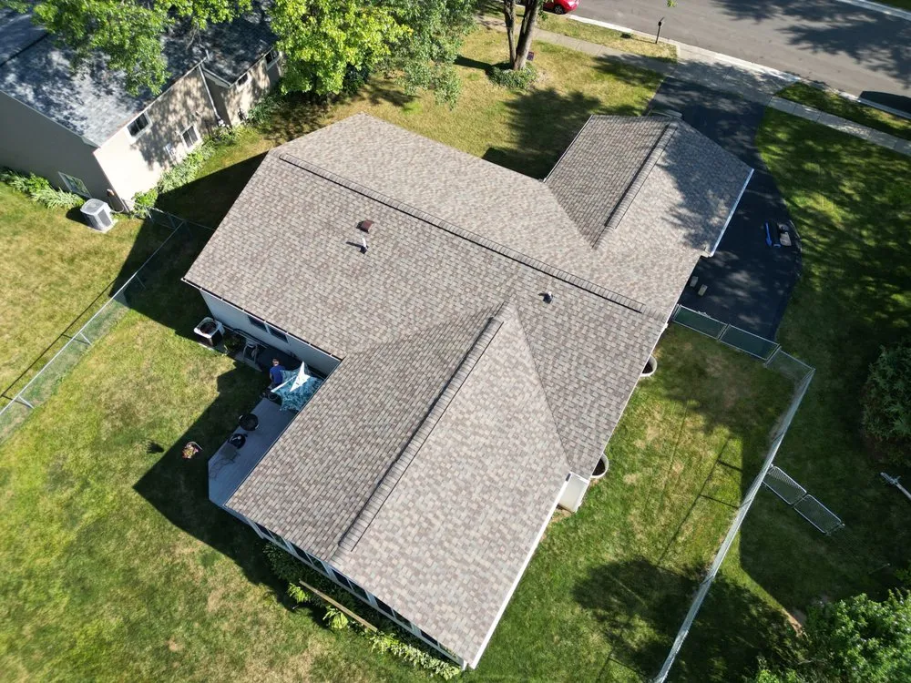 Slide of Total Quality Roofing