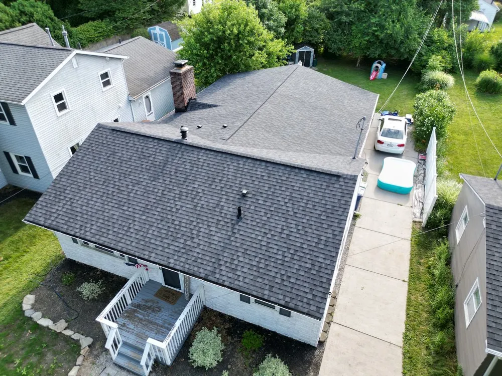 Slide of Total Quality Roofing
