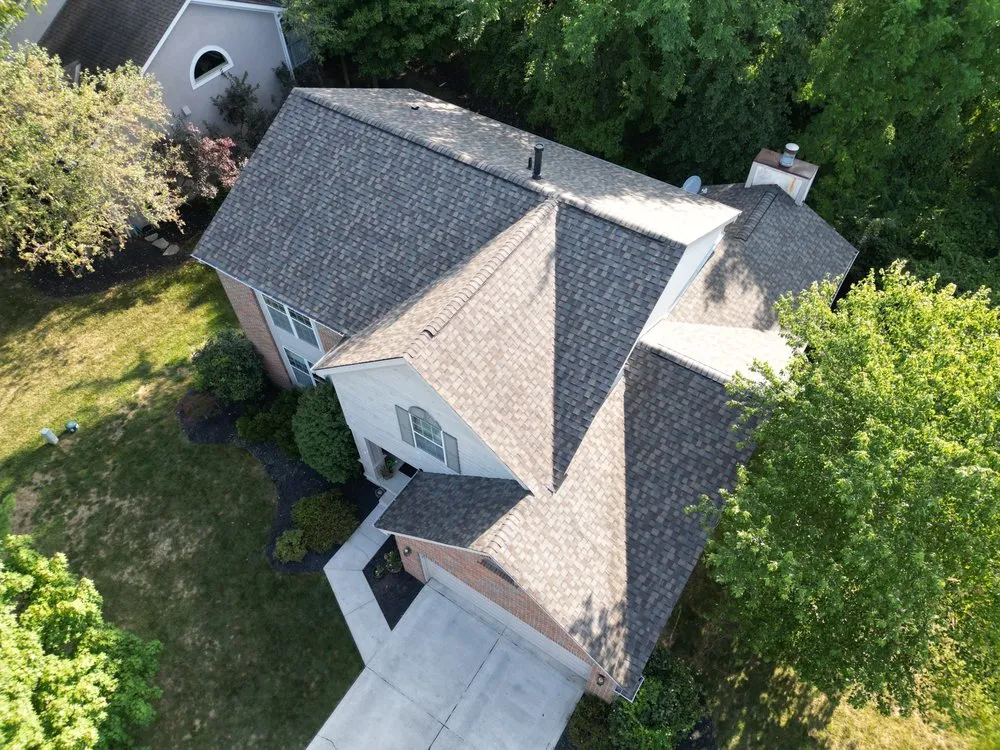 Slide of Total Quality Roofing