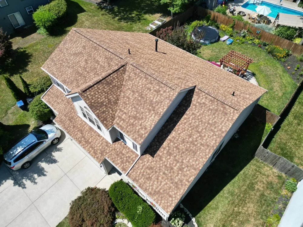 Slide of Total Quality Roofing