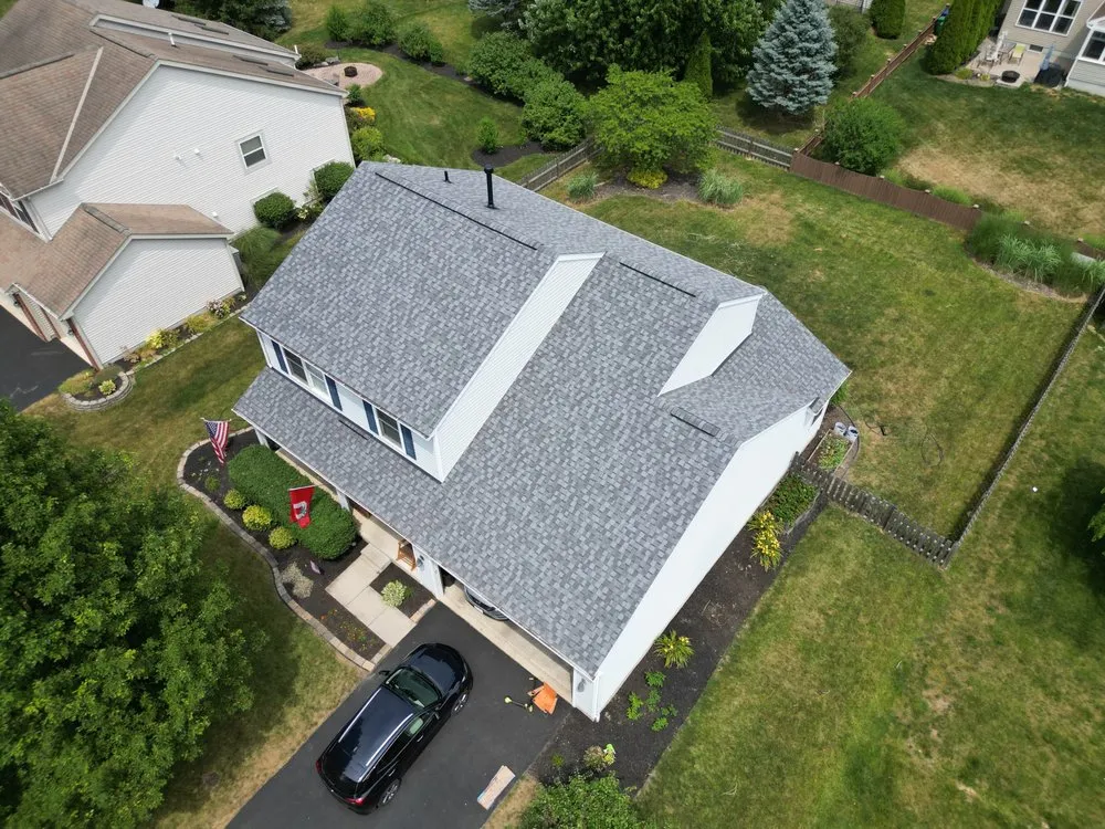 Slide of Total Quality Roofing