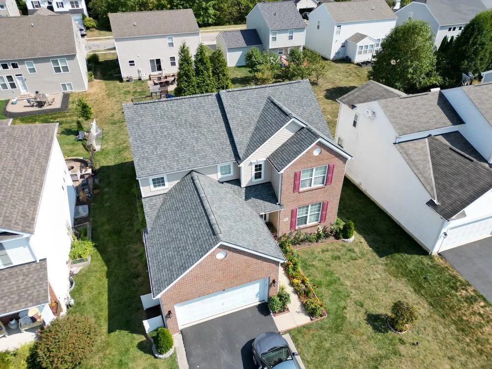 Slide of Total Quality Roofing