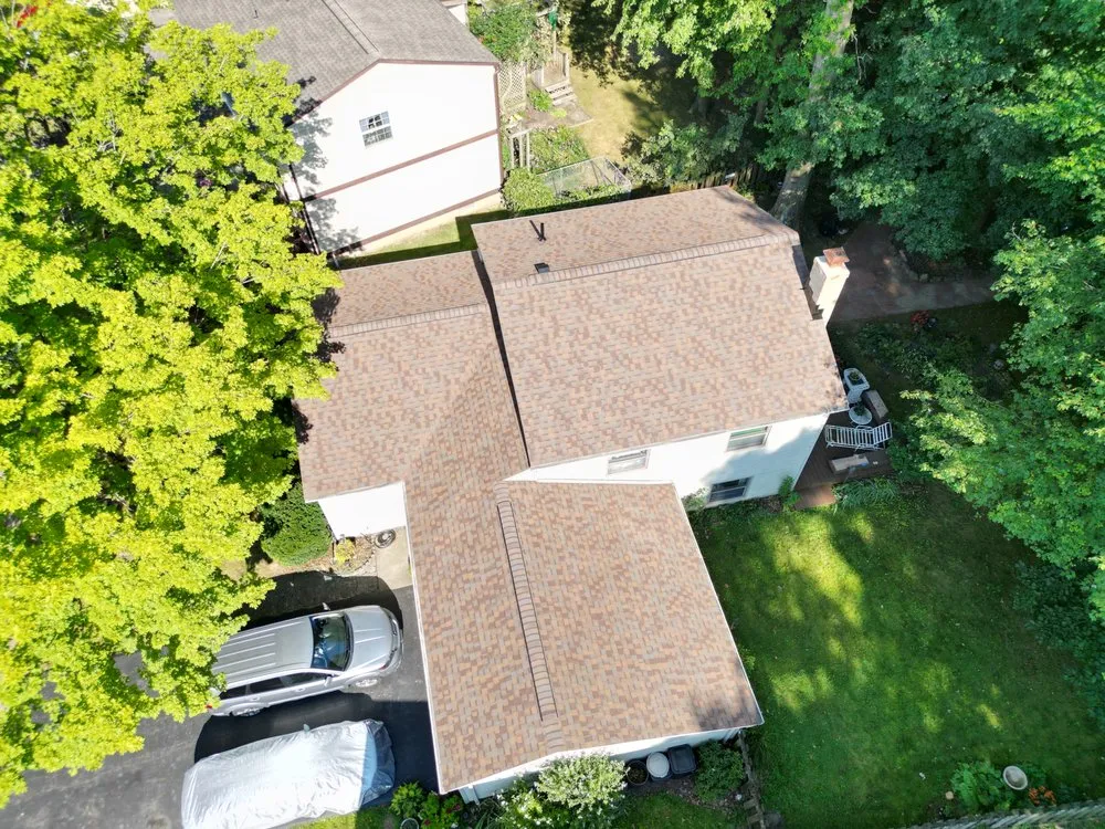 Slide of Total Quality Roofing