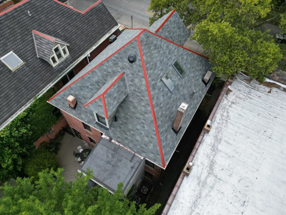 Slide of Total Quality Roofing