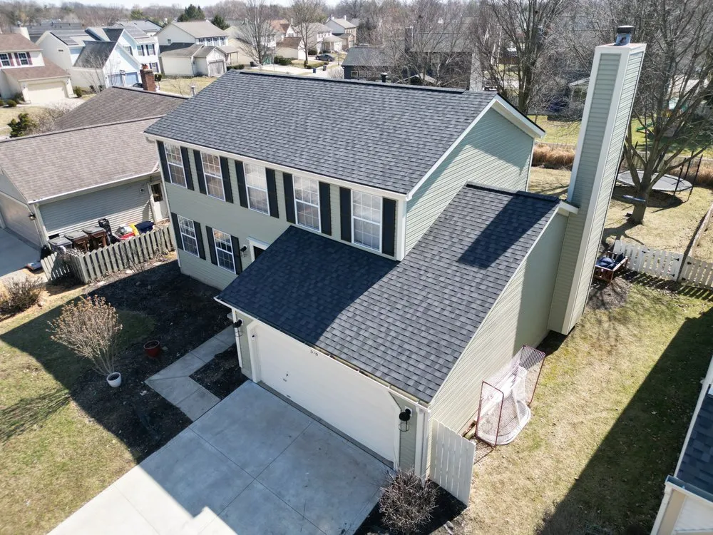 Slide of Total Quality Roofing