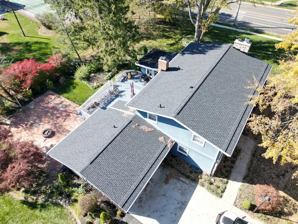 Slide of Total Quality Roofing