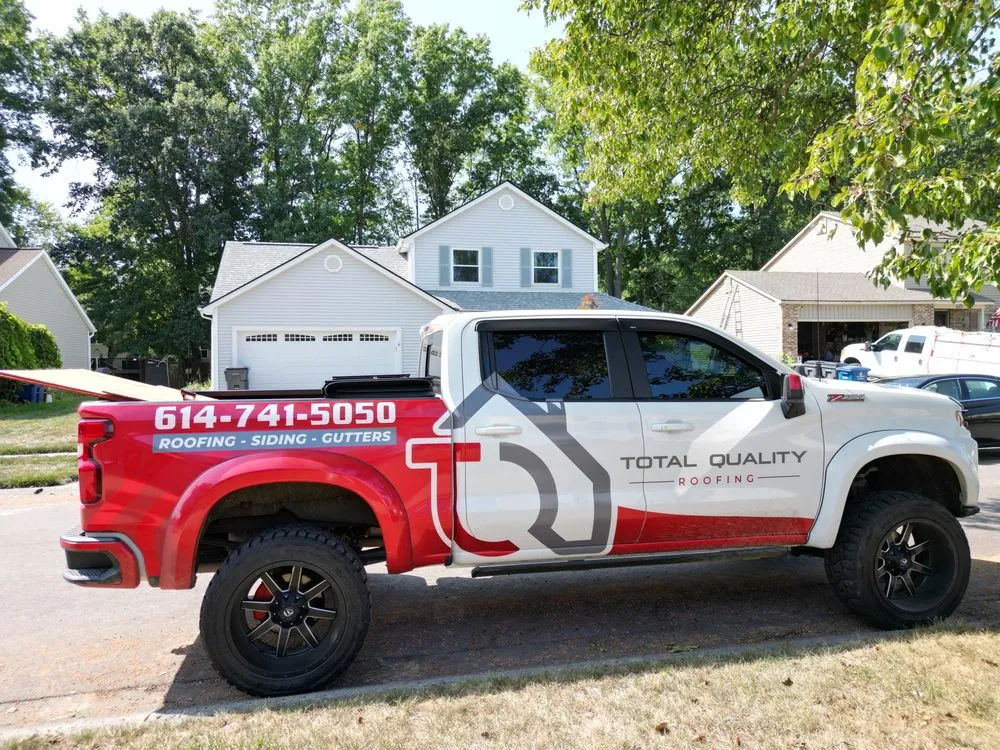 Slide of Total Quality Roofing