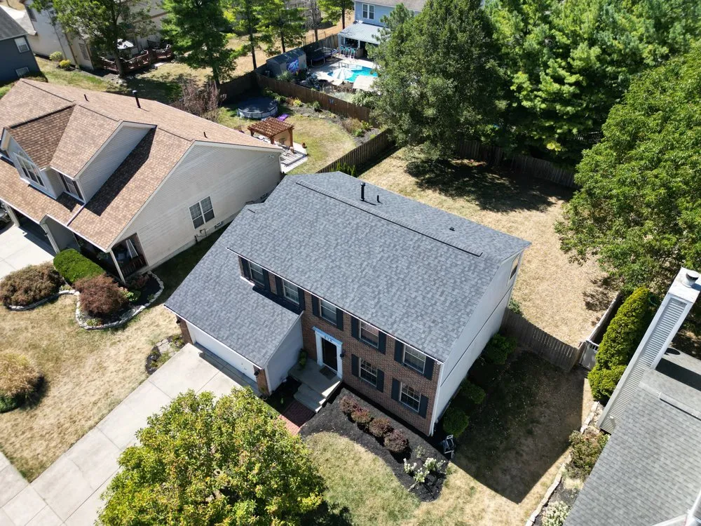 Slide of Total Quality Roofing