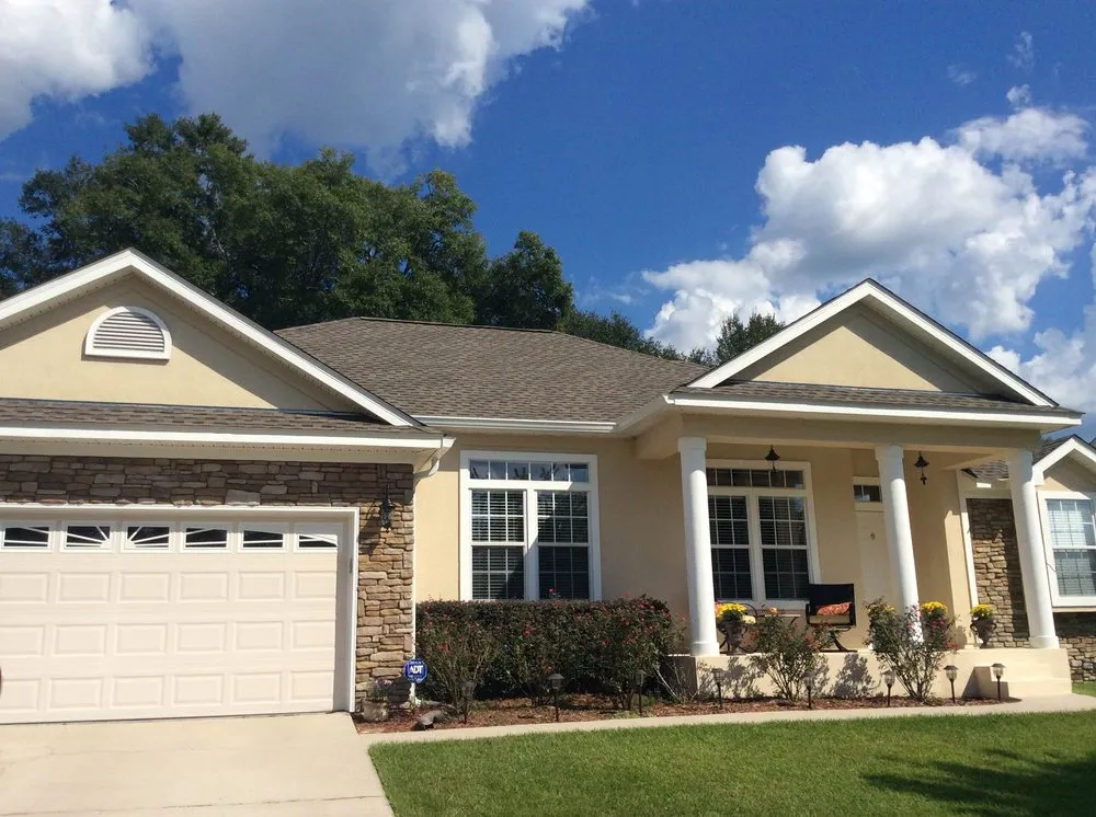 Slide of Total Quality Roofing