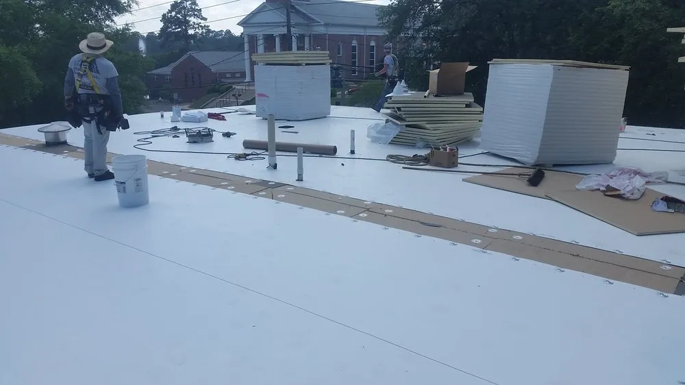 Slide of Total Quality Roofing