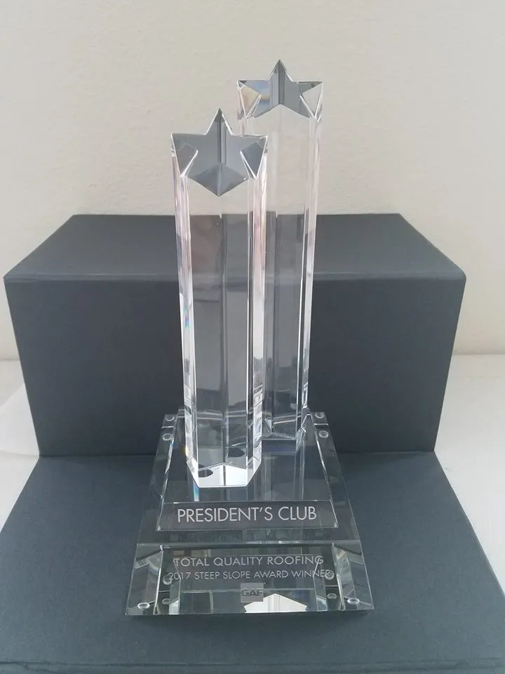 Slide of Total Quality Roofing