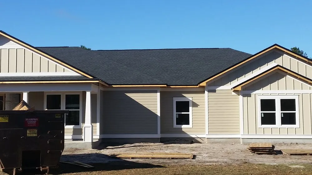 Slide of Total Quality Roofing