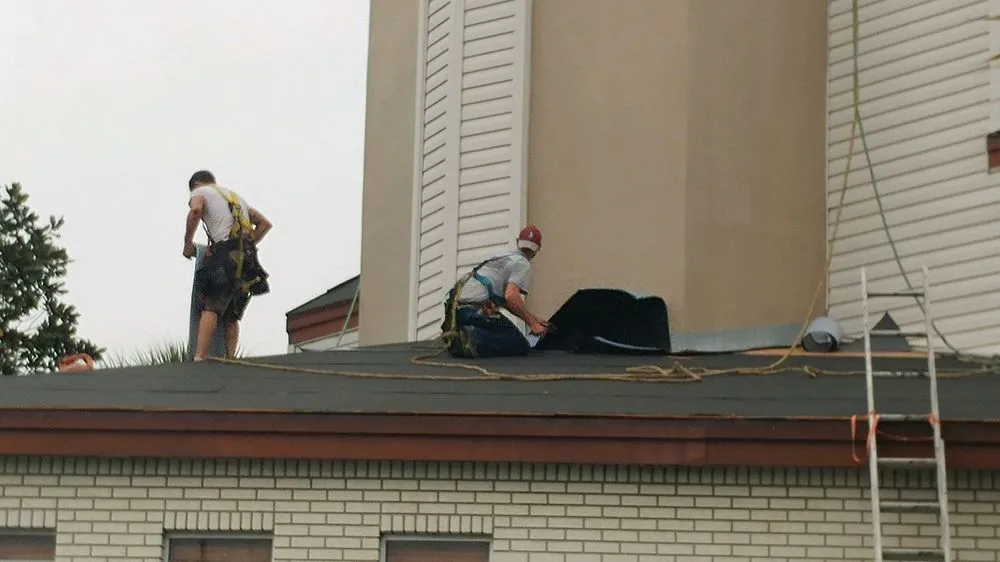 Slide of Total Quality Roofing