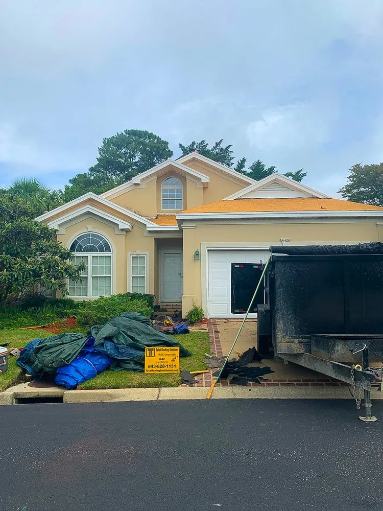 Slide of Total Roofing Solutions & Construction