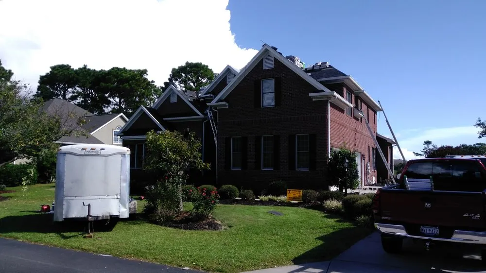 Slide of Total Roofing Solutions and Construction