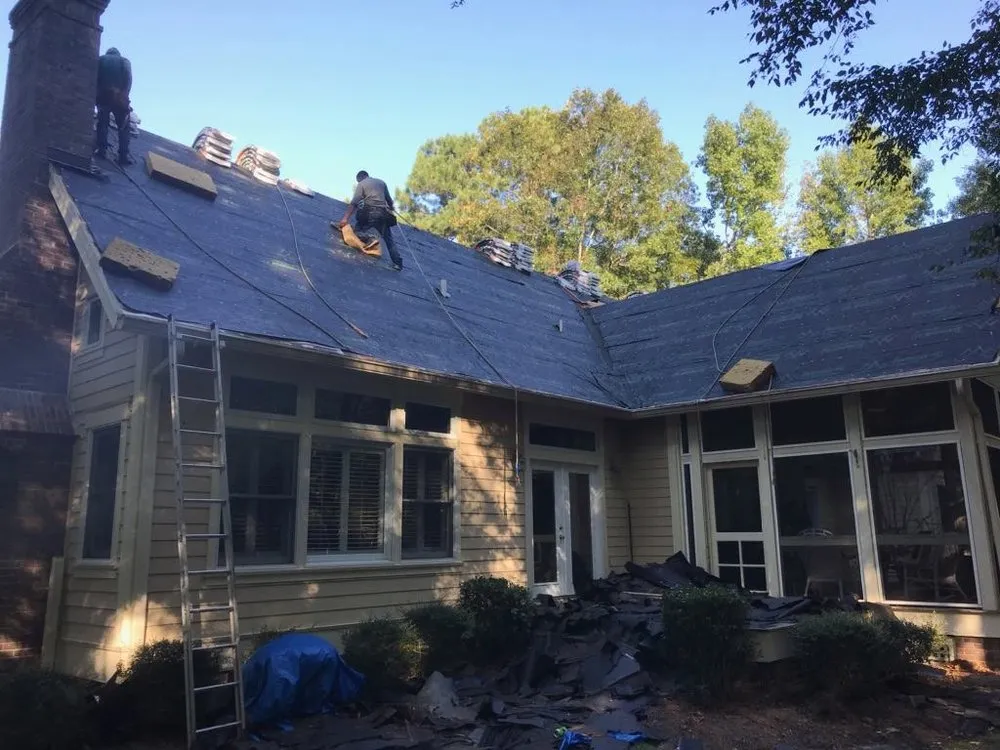 Slide of Total Roofing Solutions and Construction