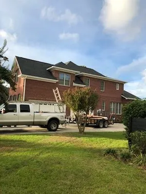 Total Roofing Solutions and Construction Logo