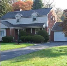 Slide of Toth Roofing