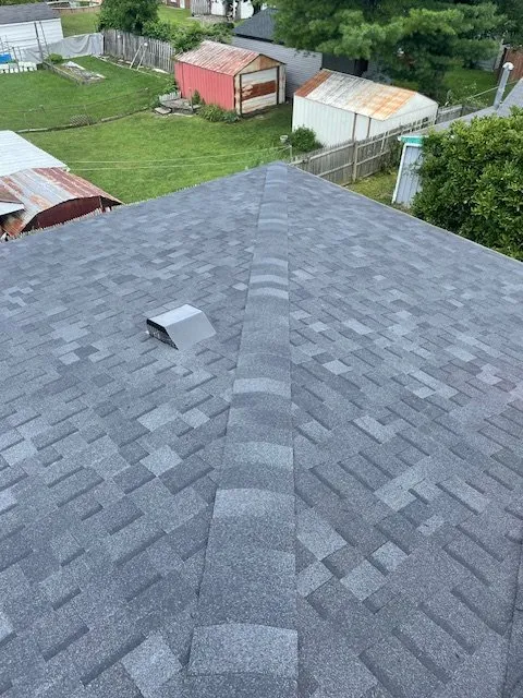 Slide of TOTL Roofing