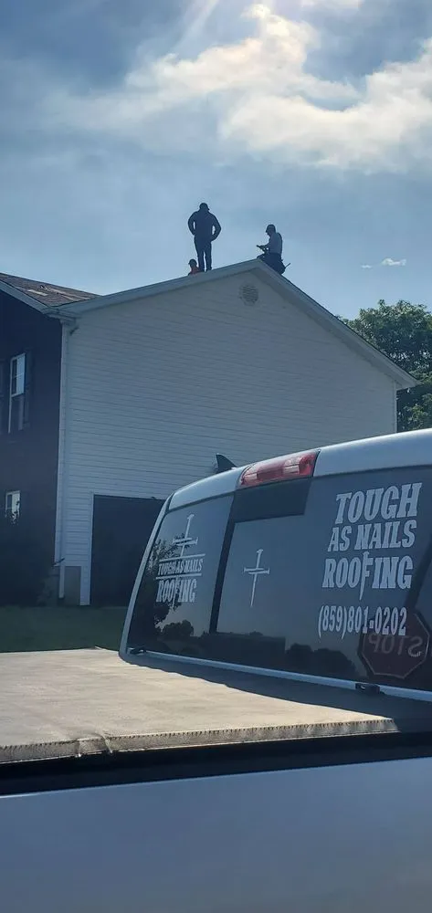 Slide of Tough As Nails Roofing And Construction