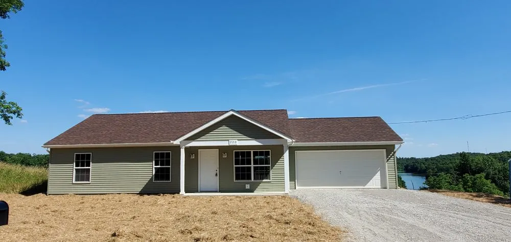 Slide of Tough As Nails Roofing And Construction