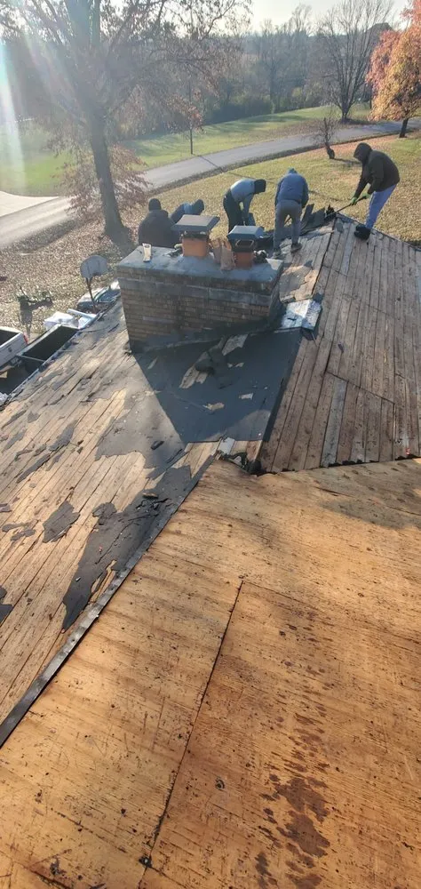 Slide of Tough As Nails Roofing And Construction