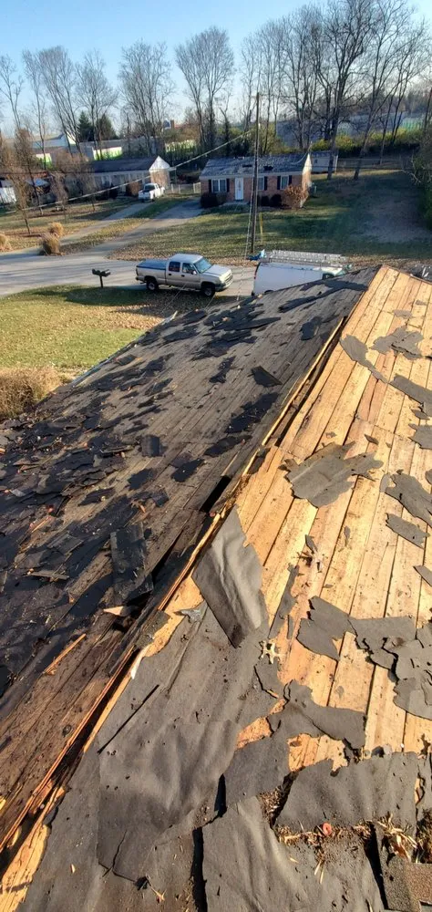 Slide of Tough As Nails Roofing And Construction