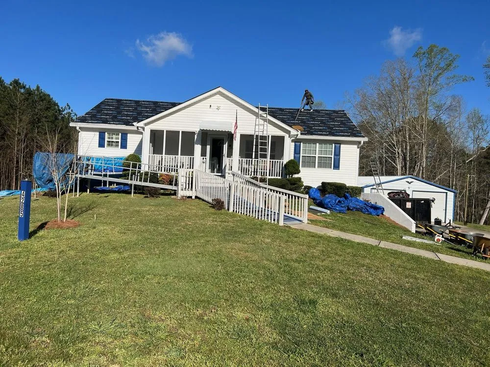 Slide of Tough As Nails Roofing Contractors