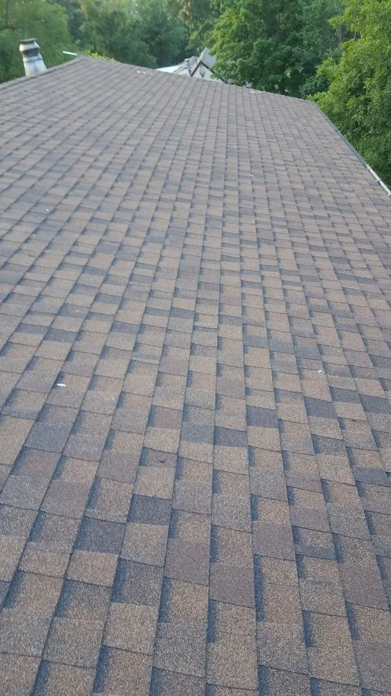 Slide of Tough As Nails Roofing