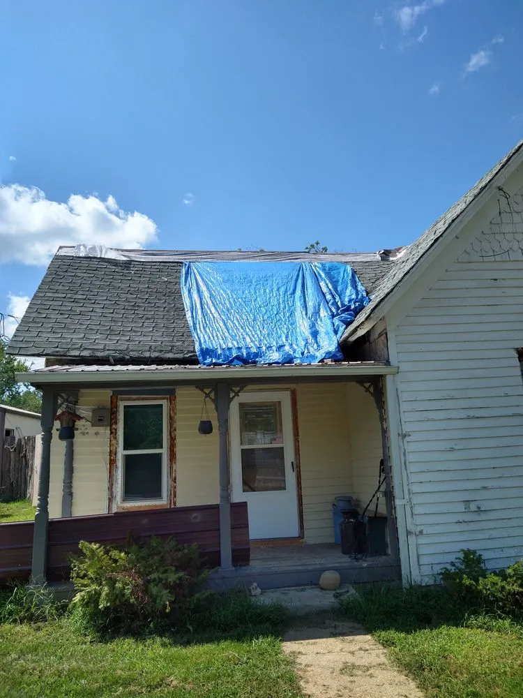 Slide of Tough As Nails Roofing