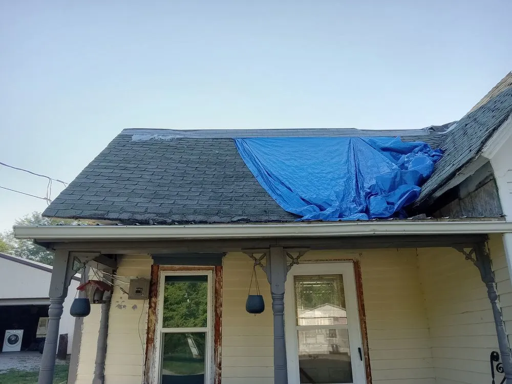 Slide of Tough As Nails Roofing