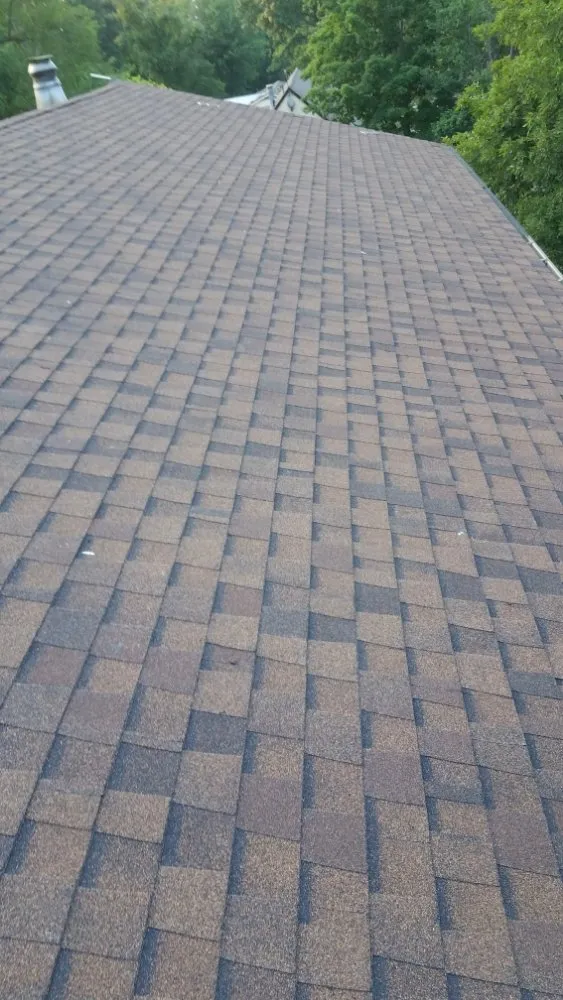 Slide of Tough As Nails Roofing