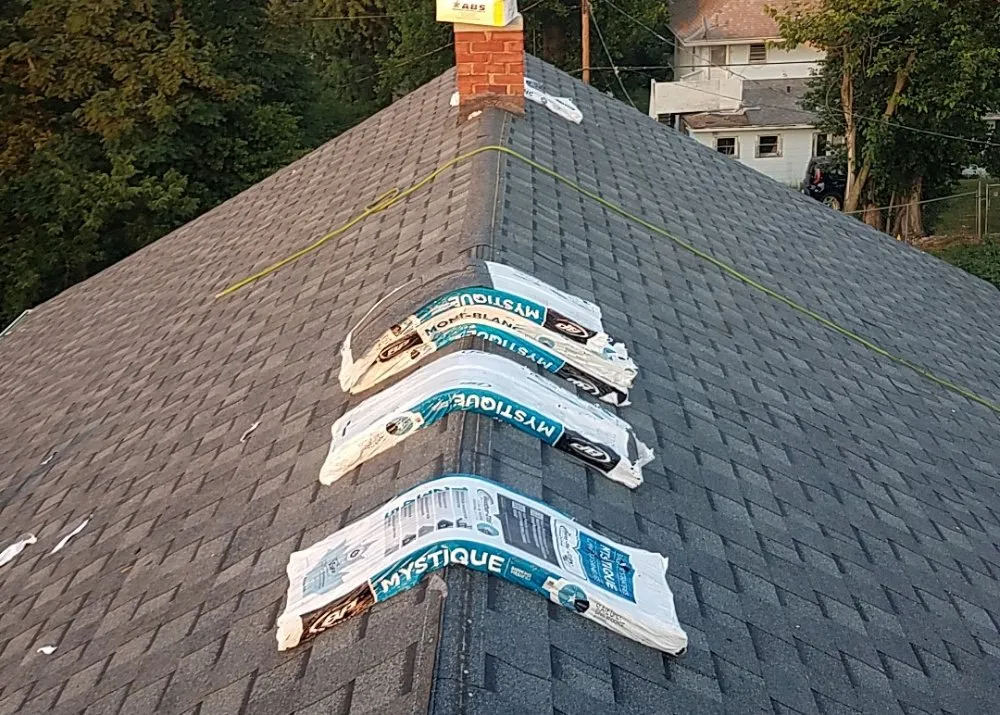 Slide of Tough As Nails Roofing