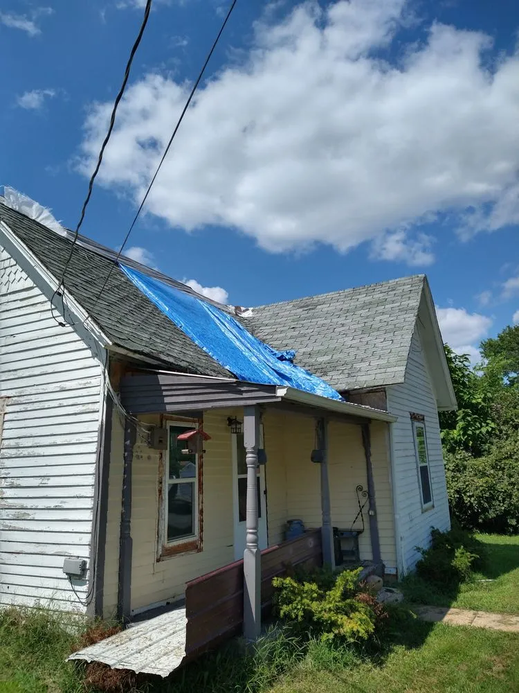 Slide of Tough As Nails Roofing