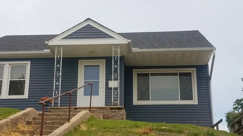 Slide of Tough As Nails Roofing