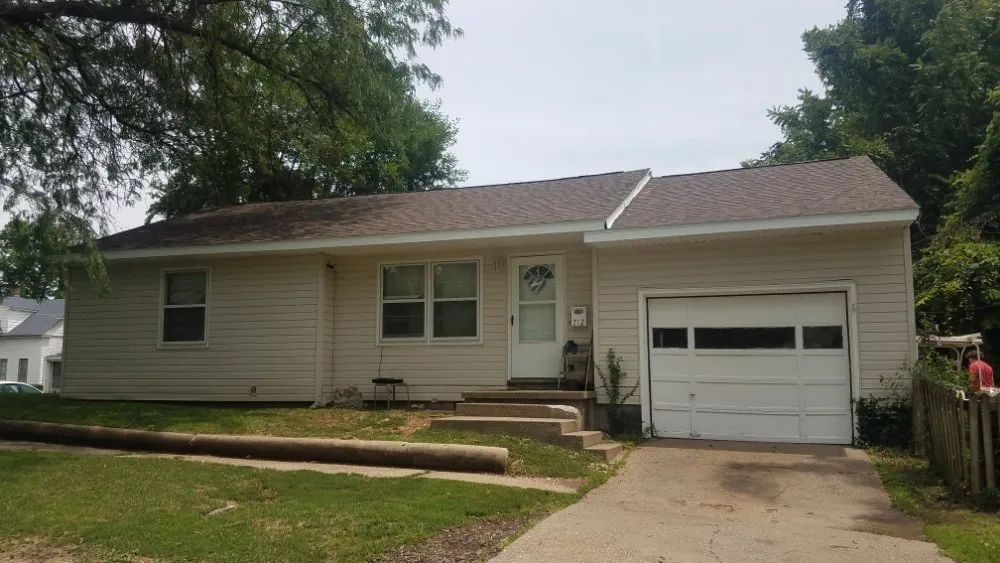 Slide of Tough As Nails Roofing