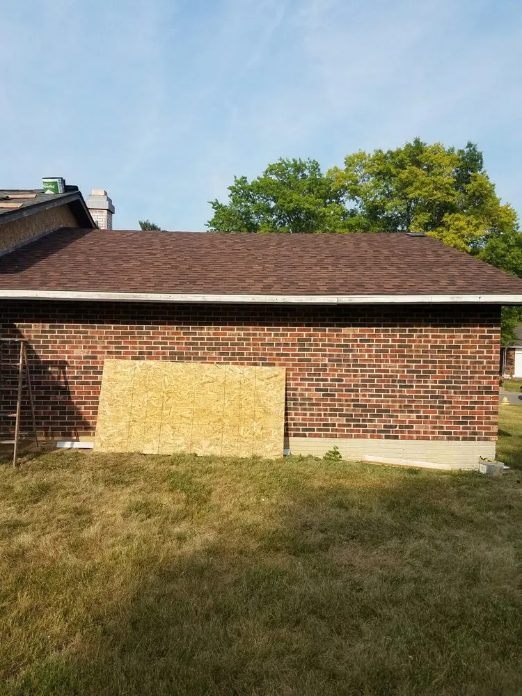 Slide of Tough As Nails Roofing