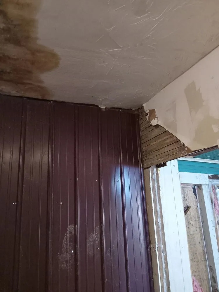 Slide of Tough As Nails Roofing