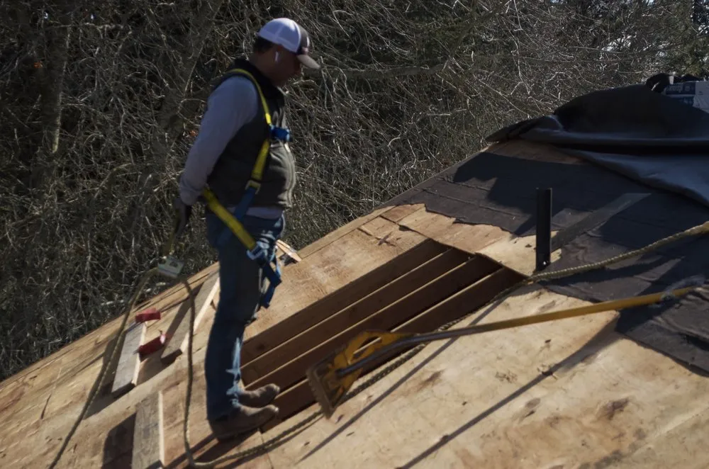 Slide of Tough Roofing