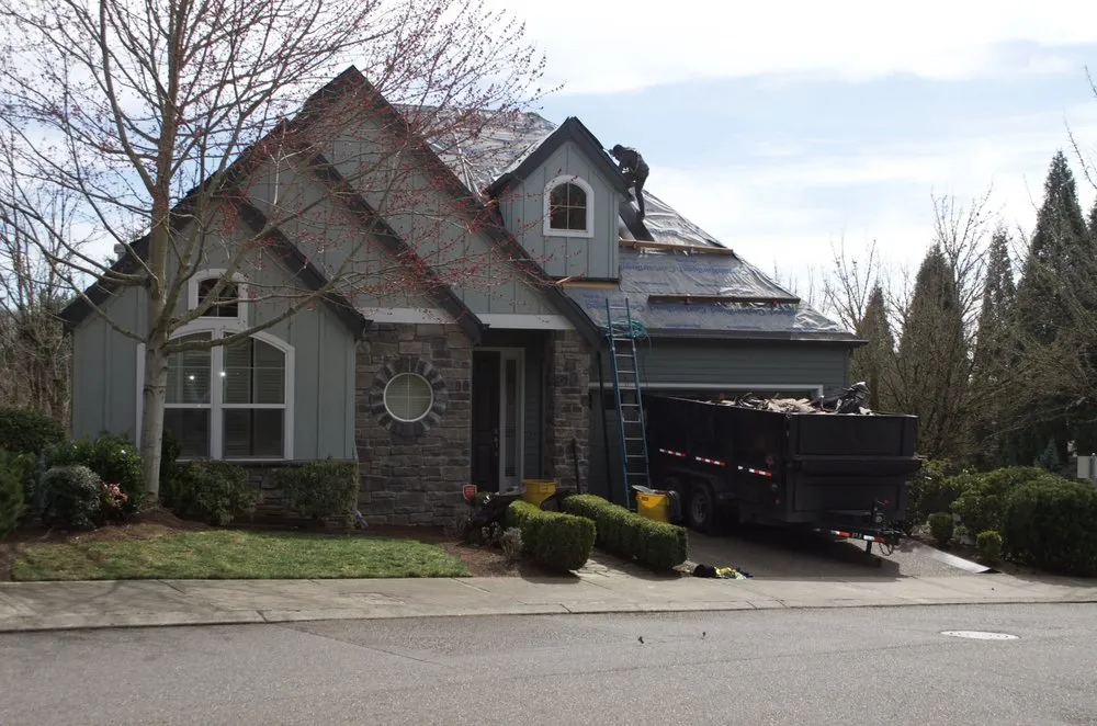 Slide of Tough Roofing