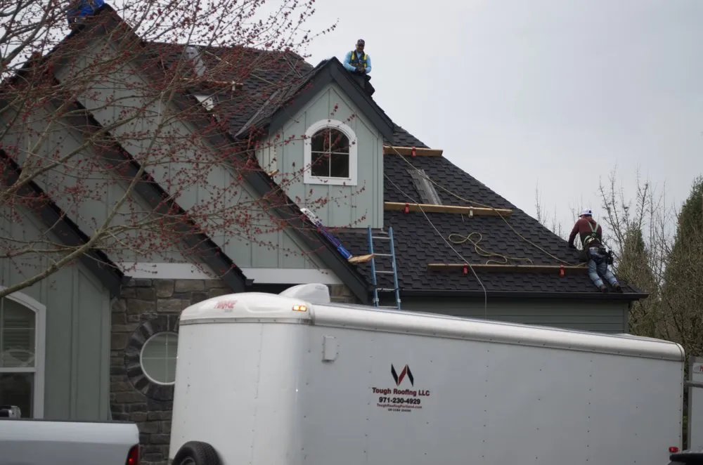 Slide of Tough Roofing