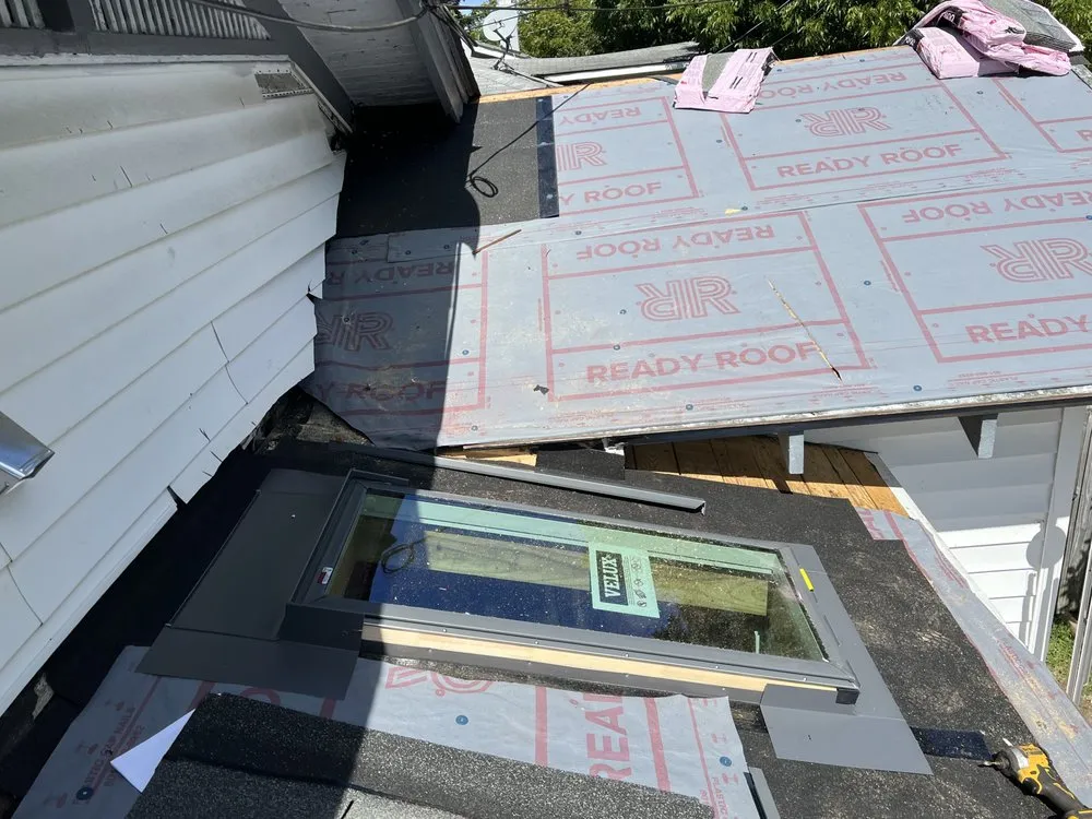 Slide of Tower Roofing & Construction