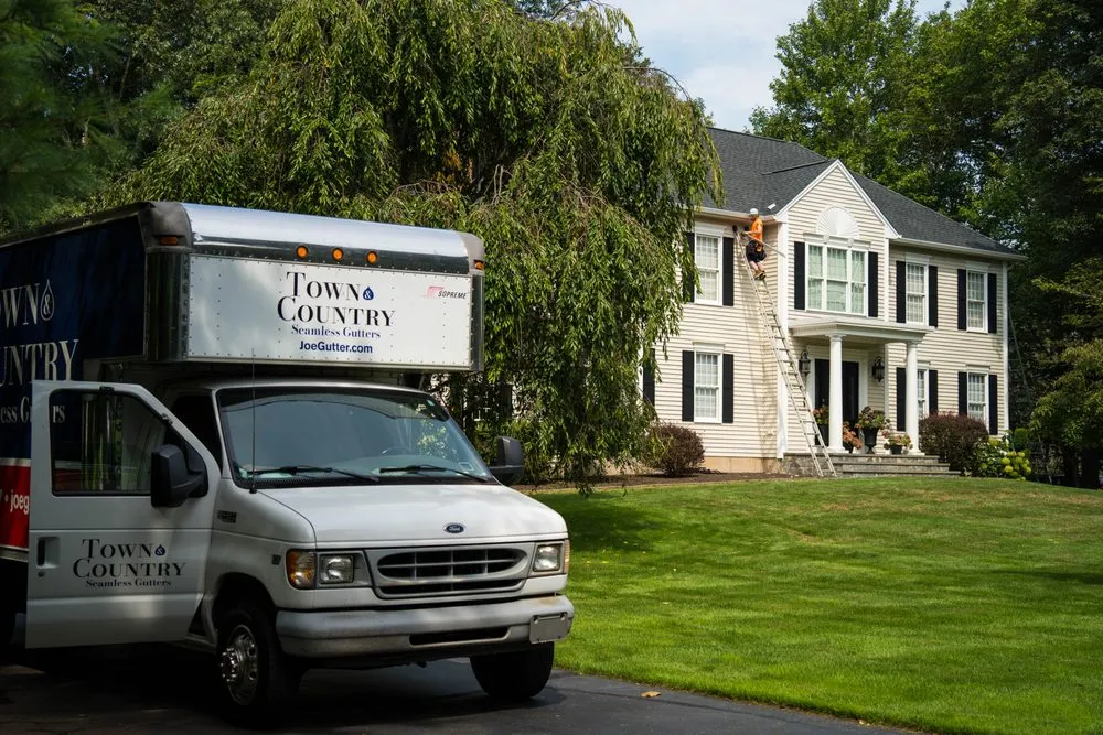 Slide of Town & Country Seamless Gutters