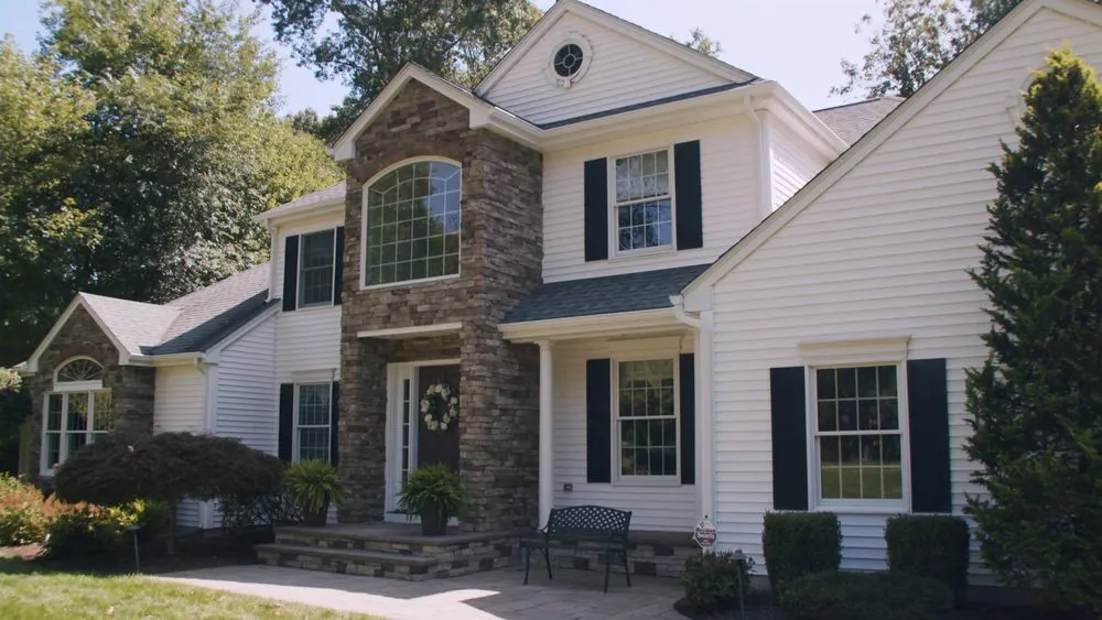 Slide of Town & Country Seamless Gutters