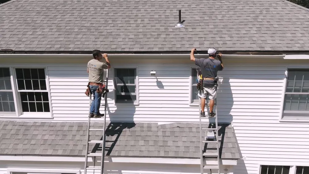 Slide of Town & Country Seamless Gutters