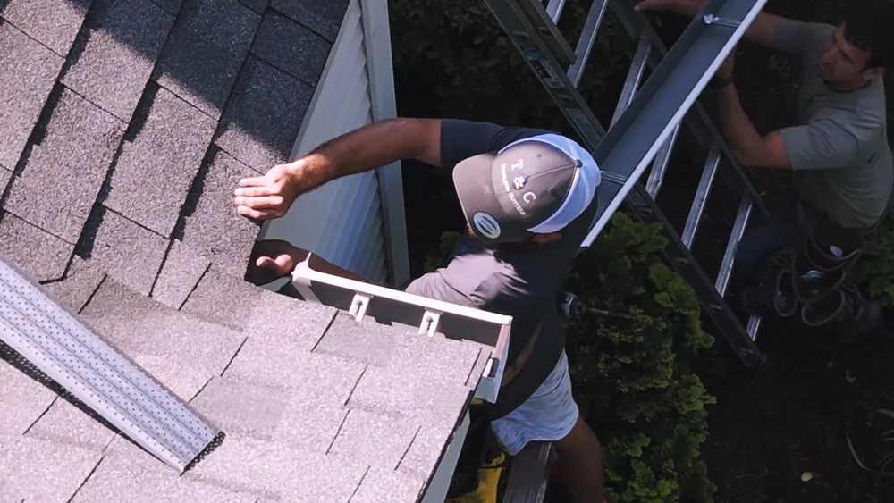 Slide of Town & Country Seamless Gutters