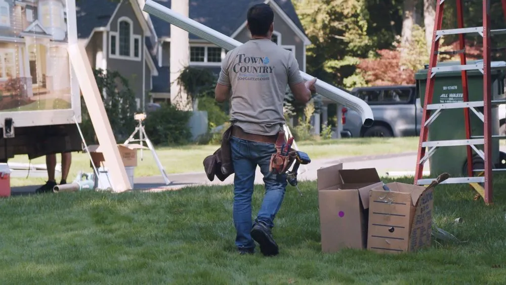 Slide of Town & Country Seamless Gutters