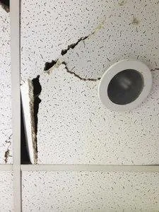 Slide of TQM Roofing