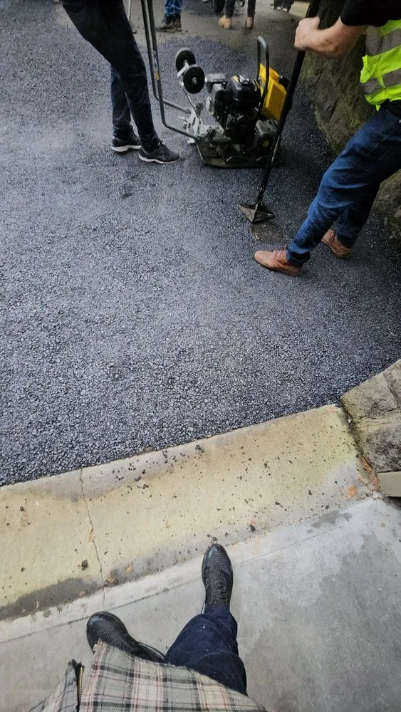 Slide of TR Renovations Roofing & Paving