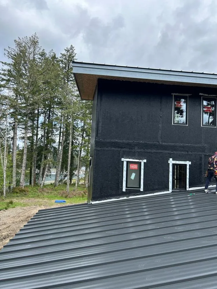 Slide of TR Roofing Company